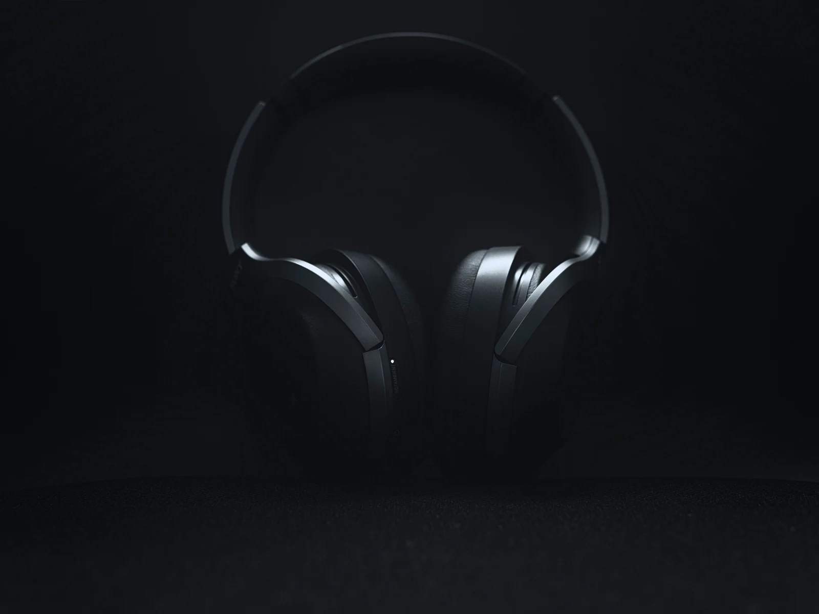 Black over-ear headphones showing their ear cushions and headband